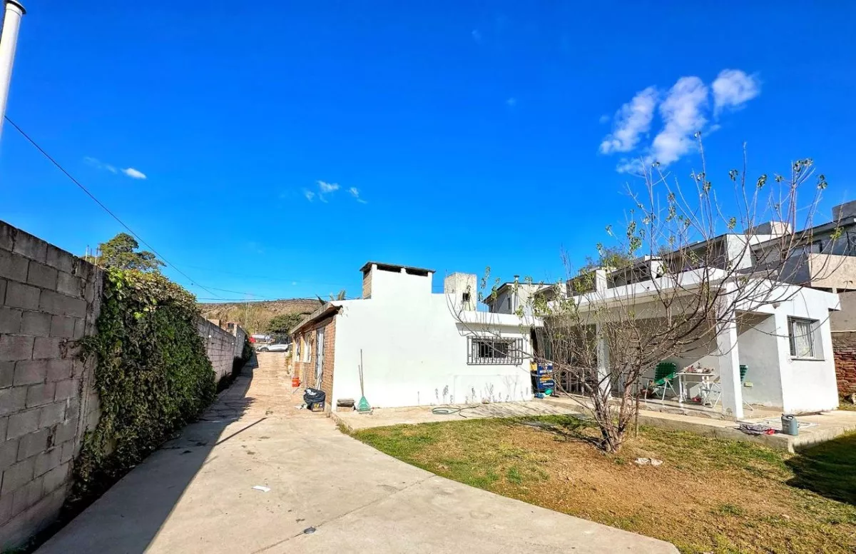 VENTA CASA CON DEPARTAMENTO CARLOS PAZ IDEAL INVERSION - Imagen ampliada 8