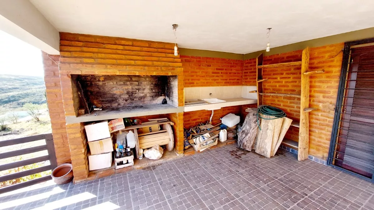 VENTA CASA VILLA DEL LAGO CARLOS PAZ 2 DORMITORIOS PILETA - Imagen ampliada 1