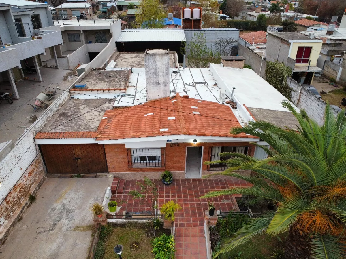 VENTA CASA CON DEPARTAMENTO CARLOS PAZ IDEAL INVERSION - Imagen ampliada 1