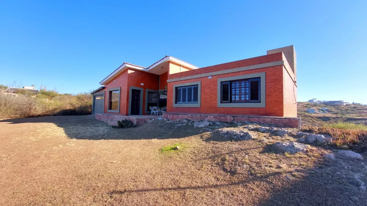 VENTA CASA VILLA DEL LAGO CARLOS PAZ 2 DORMITORIOS PILETA - Imagen ampliada 3